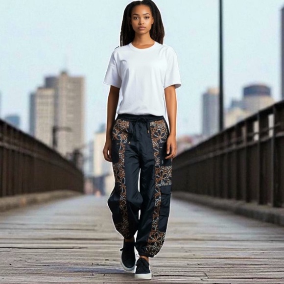 Free People Movement Mystic Moon Pants Black Embroidered Floral NWT size Med - Picture 1 of 13
